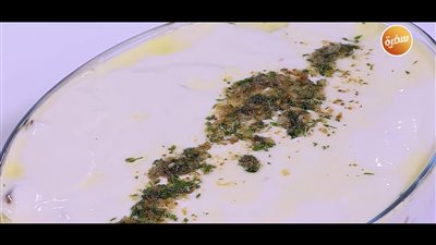 طريقة عمل فتة باذنجان بالفول والزبادي (فيديو)