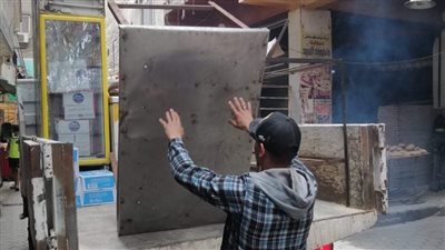 محاضر إتلاف أسفلت ورفع التعديات والمخلفات فى حملات بحى العجوزة (صور)