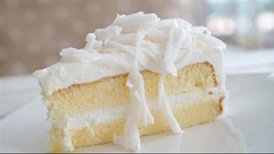 طريقة عمل الكيكة باللبن والكريمة من الشيف نجلاء الشرشابي (فيديو)