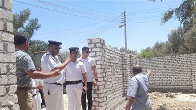 إزالة مخالفتي تعد على أراضي أملاك الدولة بمركز الطود في الأقصر 