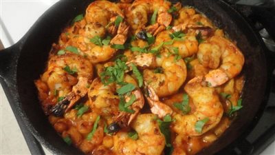 طريقة عمل طاجن الجمبري بالزبدة والثوم (فيديو)