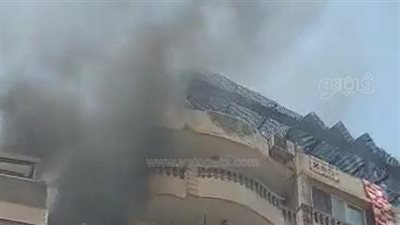 الصور الأولى لحريق شقة في شارع فيصل بالجيزة  