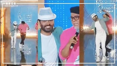 وصلة رقص لتامر حسني مع إعلامي شهير بحفل ختام مهرجان الإذاعة والتلفزيون في تونس (فيديو) 