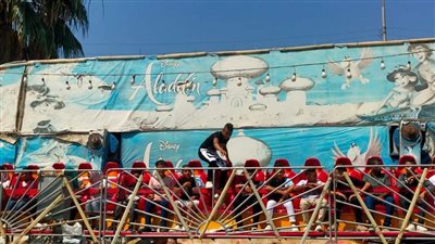 بين الملاهي والمسطحات الخضراء، زوار القناطر الخيرية يقضون أول يوم العيد (صور) 