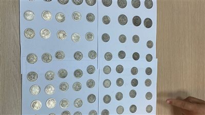 ضبط راكب مصري حاول تهريب عملات أثرية بمطار القاهرة