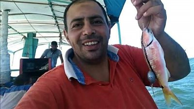 صاحب صورة الصيد أثناء حريق جليم بالإسكندرية: تفاجأت إني تريند