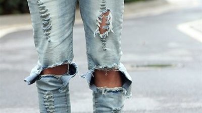 تفسير رؤية الملابس الممزقة في المنام وعلاقتها بارتكاب الذنوب والمعاصي 