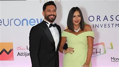 حسن الرداد وإيمي سمير غانم في مشهد كوميدي من فيلم بوشكاش