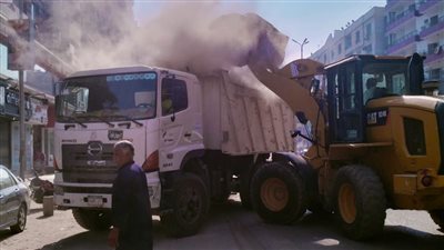 حملات مكبرة لتحسين حالة النظافة في شارع فيصل بالجيزة (صور) 
