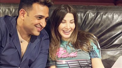 تامر حسين برفقة نانسي عجرم في كواليس 