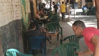  إزالة تعديات مقهي من الطريق العام في إمبابة (صور)