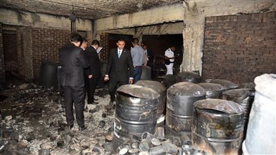 النيابة الإدارية تعاين عقار الجيزة المحترق