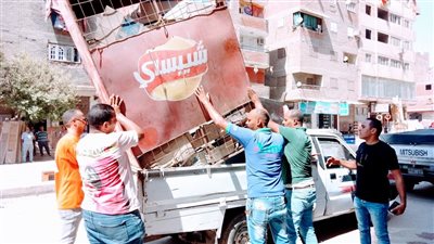 إزالة 1310 حالة إشغال وتعد للمحال والكافيهات بالجيزة (صور)