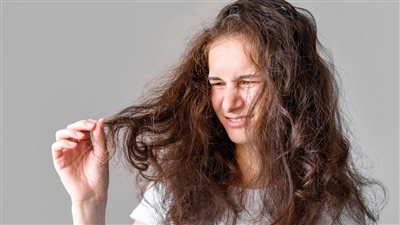 عالجي الشعر الهايش بخل التفاح 