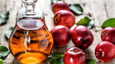 الآثار الجانبية لخل التفاح، يخفض سكر الدم والبوتاسيوم ويضر بالأسنان