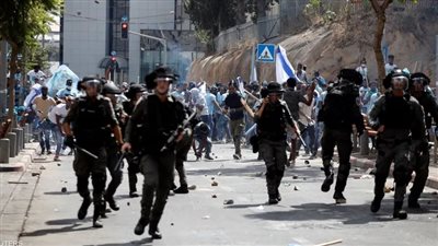 الشرطة الإسرائيلية تعتقل 39 لاجئا إريتريا إثر مواجهات دامية بتل أبيب
