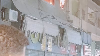 نيابة شمال الجيزة تعاين حريق مخزن محل أحذية شهير بالمنيرة الغربية (صور)