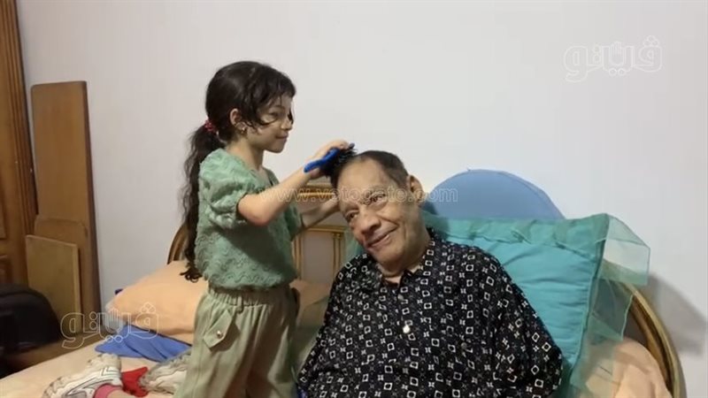 حلمي بكر وابنته،