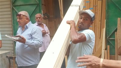 رفع التعديات والإشغالات بالعمرانية بعد شكاوى المواطنين (صور)