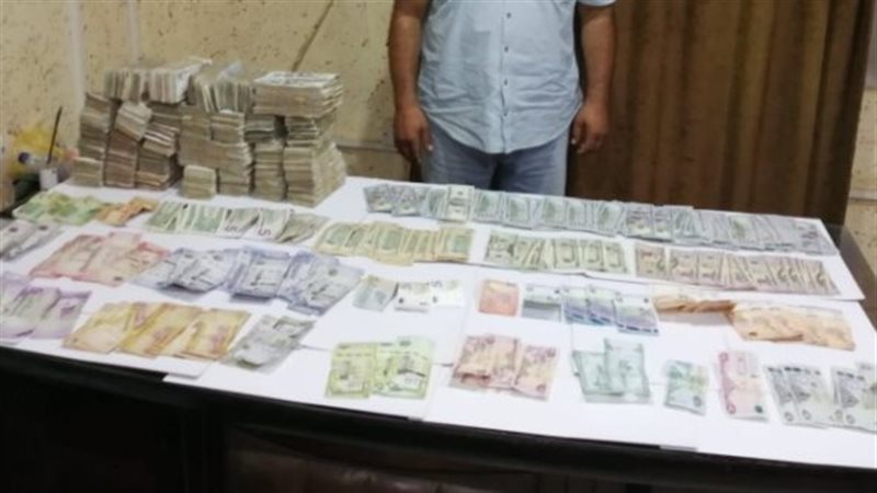 حبس تاجر عملة ببني