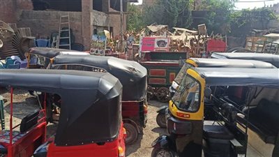 رفع إشغالات طريق وضبط 15 توك توك وسيارات مخالفة في حملة مكبرة بالجيزة | صور