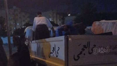 بعد ٦ ساعات مفاوضات.. أهالي عقار الدخيلة المنهار و٩ عقارات يخلون مدرسة|صور 