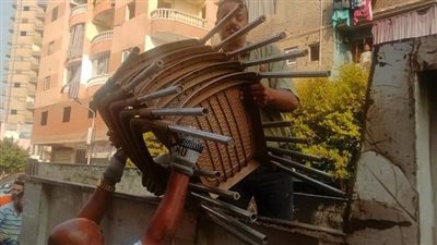 الجيزة تزيل إشغالات المقاهي والمحال في بولاق الدكرور(صور)