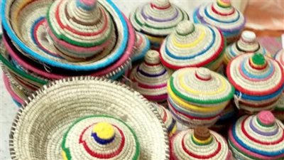 أصحاب حرفة الخوص: مشاركتنا في معرض تراثنا يساعدنا على تطوير منتجاتنا