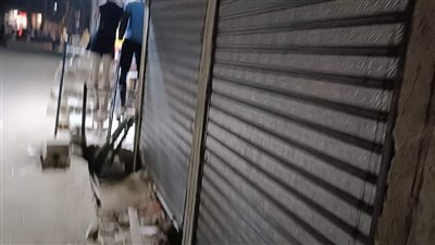 ضبط مخالفات تحويل عقار سكني لمحلات تجارية ببولاق الدكرور (صور)