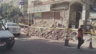 إزالة مخالفات بناء بعقار في شارع اللبيني بحى الهرم (صور)