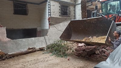 فتح شارع بالعمرانية أغلقه سكان أحد العقارات بالأسوار في الجيزة (صور)