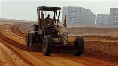 استئناف أعمال الطرق بمنطقة الرابية بتوسعات الشروق بعد توقفها