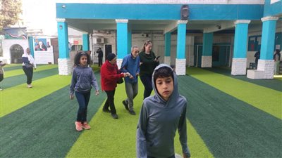 في حب مصر، أسرة كاملة تدلي بأصواتهم داخل لجنة القومية بالعجوزة (صور) 