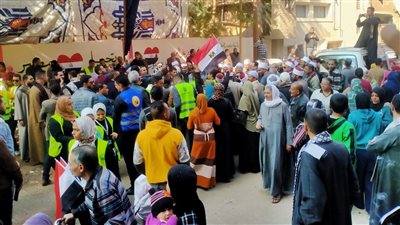 مسيرة بالطبل البلدي لأهالي أسيوط لحث المواطنين على المشاركة في الانتخابات (فيديو)
