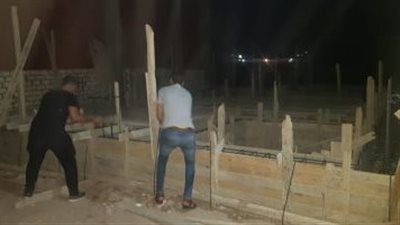 إزالة أعمال بناء مخالف لزيادة المساحة في الدقي 