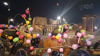 عربات الحنطور في الأقصر تتزين بالبالونات احتفالًا برأس السنة (صور)