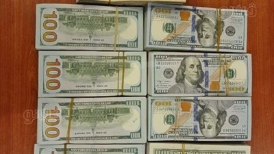 ضبط شخصين بمطار القاهرة حاولا تهريب مبالغ مالية