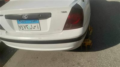 محافظة الجيزة تزيل إشغال السيارات المخالفة على رصيف كورنيش الوراق