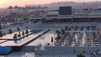 شاشات عرض في فروع الأهلي لمشاهدة مباراة مصر وغانا