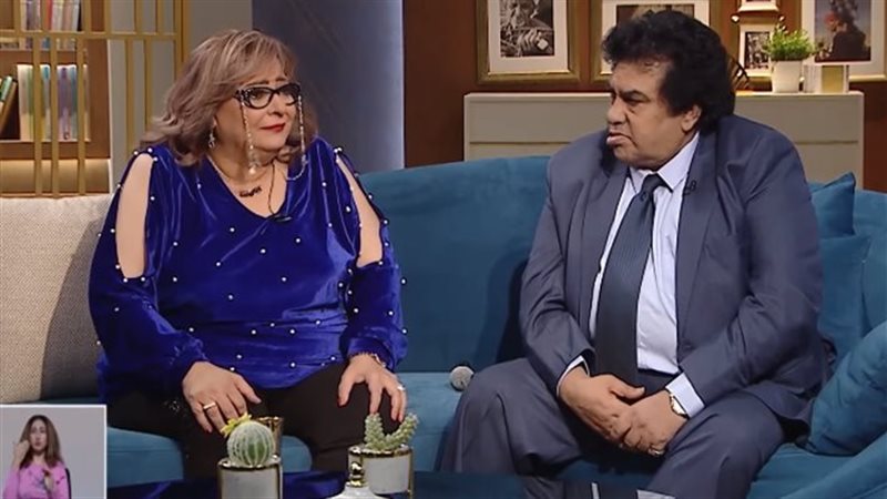أحمد عدوية وزوجته،