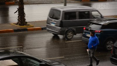 سقوط أمطار وانخفاض درجات الحرارة بالقاهرة والجيزة ( صور)