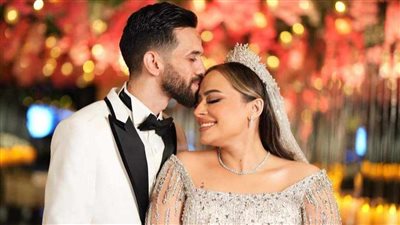 جلسة تصوير لشقيقة كهربا مع زوجها 