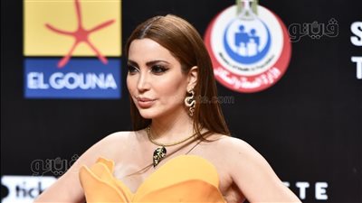 نسرين طافش تتألق بـ البرتقالي على ريد كاربت مهرجان الجونة|فيديو وصور