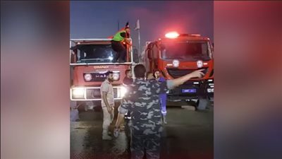 ماس كهربائي وراء حريق برج سكني في الدقي