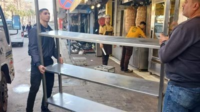 رفع 120 حالة إشغال لمطاعم ومحال متعدية على الطريق العام بالهرم والعمرانية