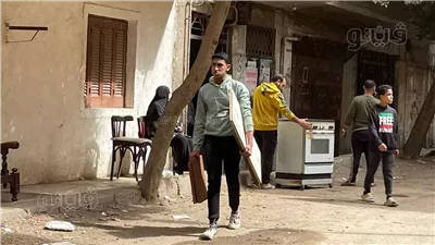 أهالي العقارات المجاورة لـ ستوديو الأهرام يجمعون مقتنياتهم لمغادرة منازلهم (صور) 