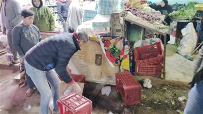 شن حملة لإزالة الإشغالات بالكوم الأخضر بشارع الهرم في الجيزة (صور)