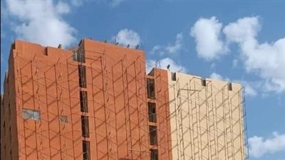 محافظة الجيزة تبرز أعمال طلاء وتجميل العقارات المطلة على الطريق الدائري (صور)