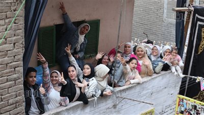 من الشرفات، شاهد كيف تشارك نساء المطرية في حفل الإفطار السنوي