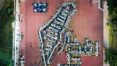 طاولات إفطار كلية الطب جامعة الإسكندرية على هيئة خريطة فلسطين (صور)